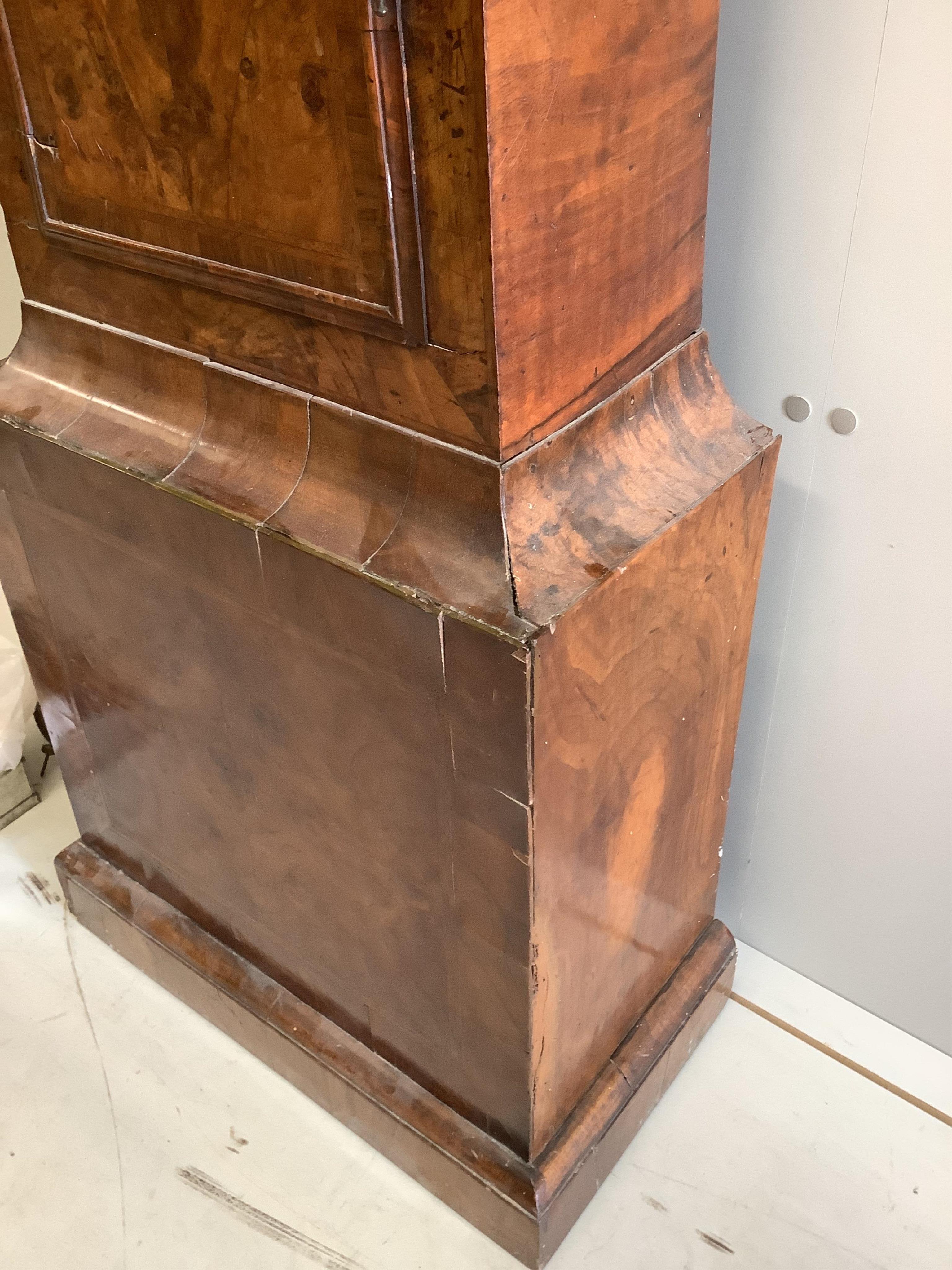 A George II walnut and feather banded longcase clock, Christopher Pinchbeck, London, height 237cm. Condition - poor